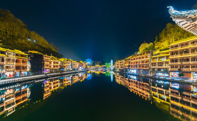 Fototapeta na wymiar Blues night view of Phoenix Ancient Town in Xiangxi, Hunan, China