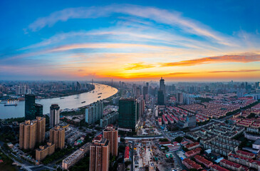Fototapeta premium Aerial view of modern city skyline and buildings at sunrise in Shanghai.