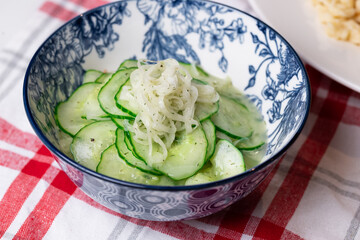 Hungarian cucumber salad with dill and thinly sliced onions