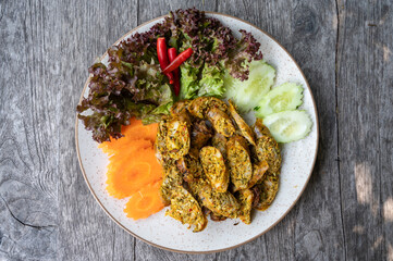 High angle view of Northern Thai Sausage (or Sai Oua) served with vegatables.