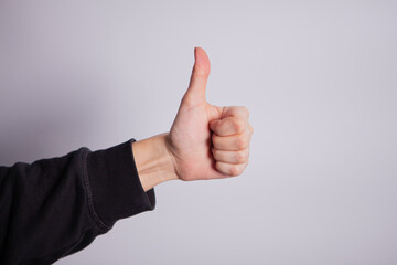 You did it hand gesturing thumb up isolated on white background
