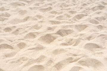 Fototapeta na wymiar Sand on the beach for background. Brown beach sand texture as background.