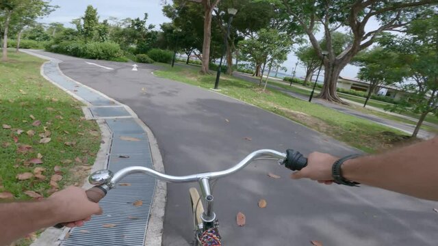 Caucasian Man Riding A Vintage Bicycle On A Rural Bike Path, Chest Camera POV.