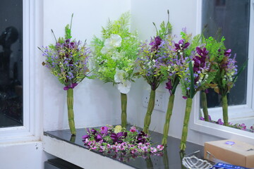 flowers in pots on a balcony