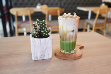 Matcha latte served on the table. photo concept for commercial use 