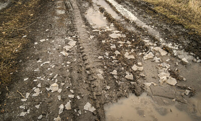 Ice on the dirt road. Autumn steppe. November. Natural background. Landscape