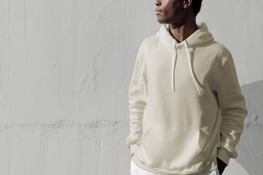 Man in white hoodie streetwear men&rsquo;s apparel fashion