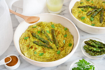 Close-up of a vegetarian flan with asparagus and tofu
