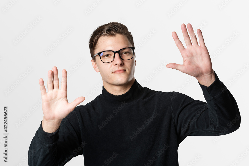 Aufkleber man touching invisible screen with both hands