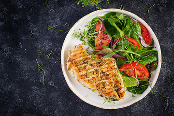 Grilled chicken fillet with salad. Keto, ketogenic, paleo diet. Healthy food.  Diet lunch concept. Top view, overhead, copy space
