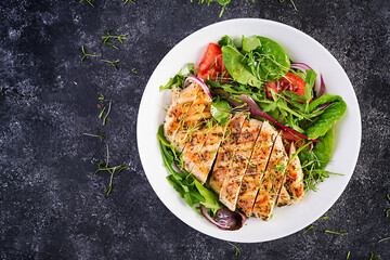 Grilled chicken fillet with salad. Keto, ketogenic, paleo diet. Healthy food.  Diet lunch concept. Top view, overhead, copy space