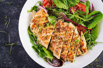 Grilled chicken fillet with salad. Keto, ketogenic, paleo diet. Healthy food.  Diet lunch concept. Top view, overhead, copy space