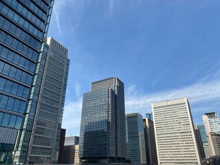 Fototapeta na wymiar Skyscrapers in front of Tokyo Station (Marunouchi, Chiyoda-ku, Tokyo, Japan).