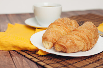 croissant in a plate on the table kitchenware breakfast meal 