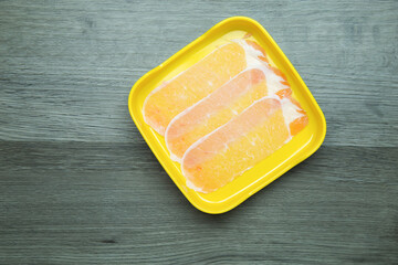 fresh raw pork, meat ,beef, belly, sliced on square plate  on wood, wooden background,set shabu, hot pot ingredients.