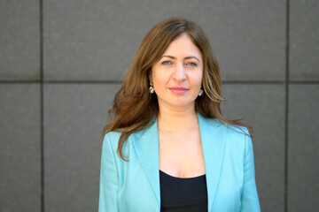 Attractive stylish middle-aged woman with a friendly smile