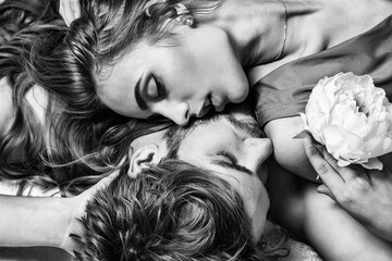 Sexy young couple in love. Portrait of intimate passionate sensual people. Kiss each other,...