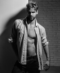 Handsome athlete gay. Handsome confident young man. Sexy muscled male model strong nude body. Naked...