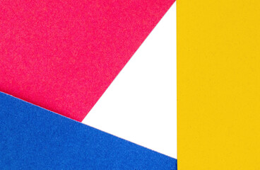 Abstract background made of colored sheets of velvet paper. Red, Blue and Yellow