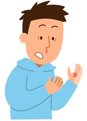 鼻血が出て驚いている男性