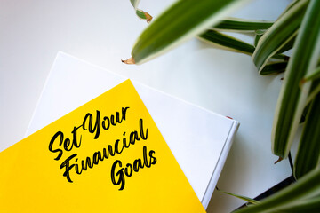 Set Your Financial Goals write on Sticky Notes. Motivation conceptual Image