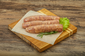 Raw pork meat sausages for grill