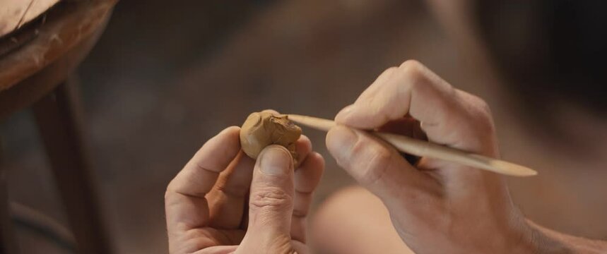 Artist Sculpting Clay Sculpture Head Tool In Hands Atelier Close Up