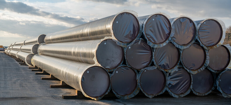 A stack of pipes on the construction site of a gas pipeline that will be laid on the seabed