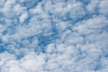 white little clouds on blue sky