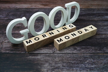 Good Morning Monday Word alphabet letters on wooden background