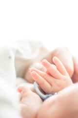 Fototapeta na wymiar Baby feet. Tiny Newborn Baby's feet and hands closeup. Happy Family concept. Beautiful conceptual image of Maternity. Banner