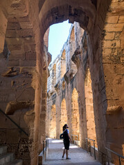 Person posing in the Amphitheater of El Djem in Tunisia