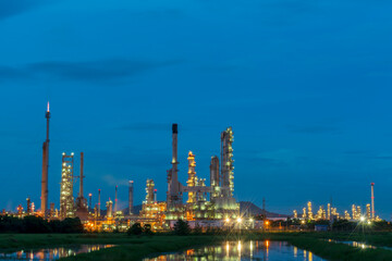 Obraz na płótnie Canvas Oil refinery gas petrol plant industry with crude tank, gasoline supply and chemical factory. Petroleum barrel fuel heavy industry oil refinery manufacturing factory plant. Refinery industry concept