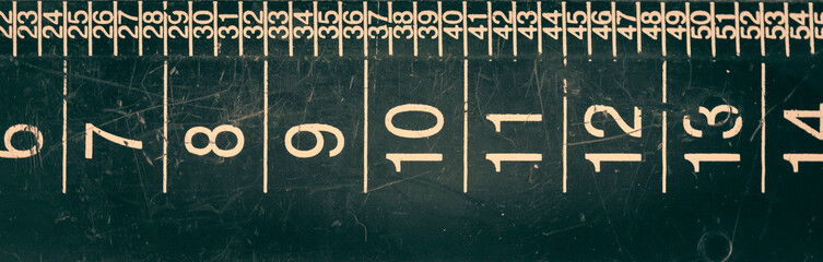 Plastic ruler close-up. Vintage tinting