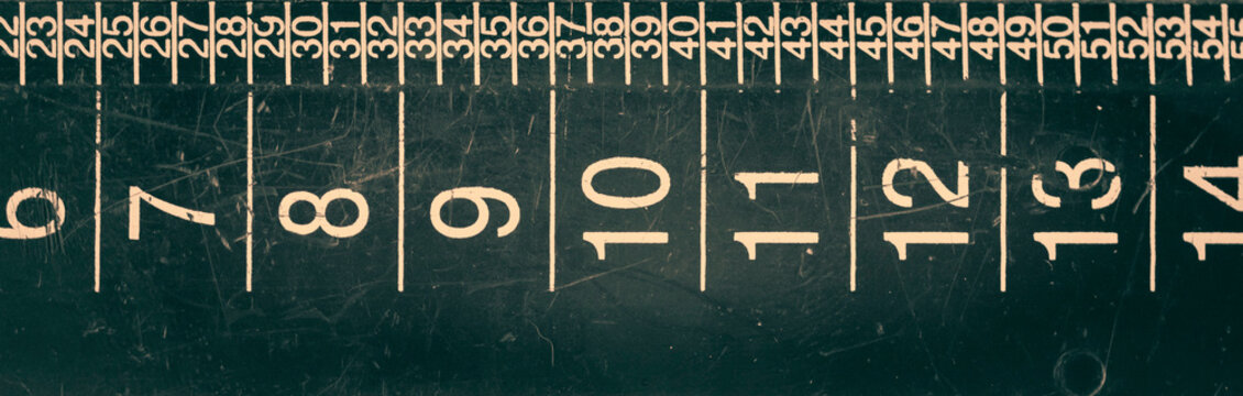 Plastic ruler close-up. Vintage tinting