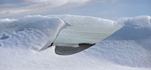 The abstract background of ice structure in a lake landscape.