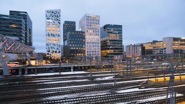 Night View Of Barcode District And Oslo Central Station In Downtown Oslo, Norway. wide shot