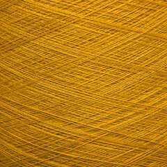 Colored yarn threads orange macro
