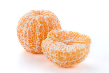 Close-up peeled oranges isolated on a white background