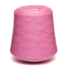 Colored yarn threads pink isolated