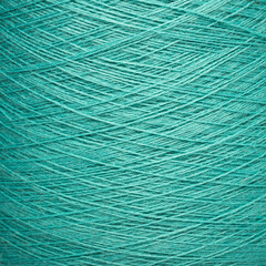 Colored yarn threads green macro