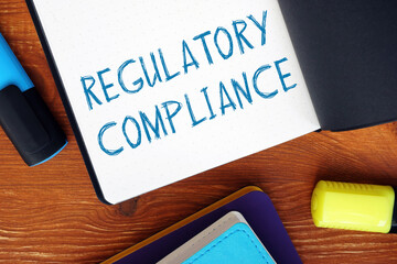 Conceptual photo about REGULATORY COMPLIANCE exclamation marks with written phrase.