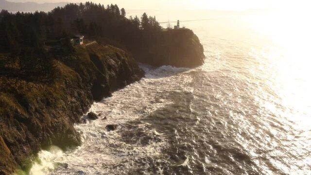 Dream World Ocean Coastline Aerial with Lighthouse in Orange Sunlight