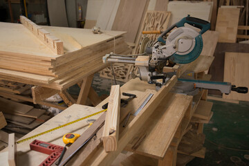 Electric circular saw machine in a carpenter workshop 