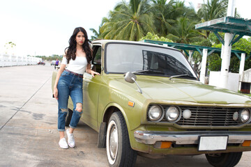 Young lady and old pickup truck