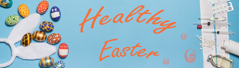 A medical banner with ECG, medicines and syringes with the Easter concept painted eggs and rabbit ears on a blue background with the inscription Healthy Easter.