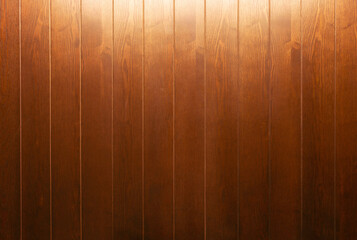 brown wooden wall with light on top