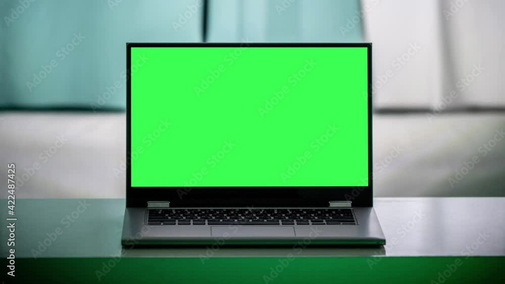 Poster working in the evening. laptop with green screen. zoom in. template for keying