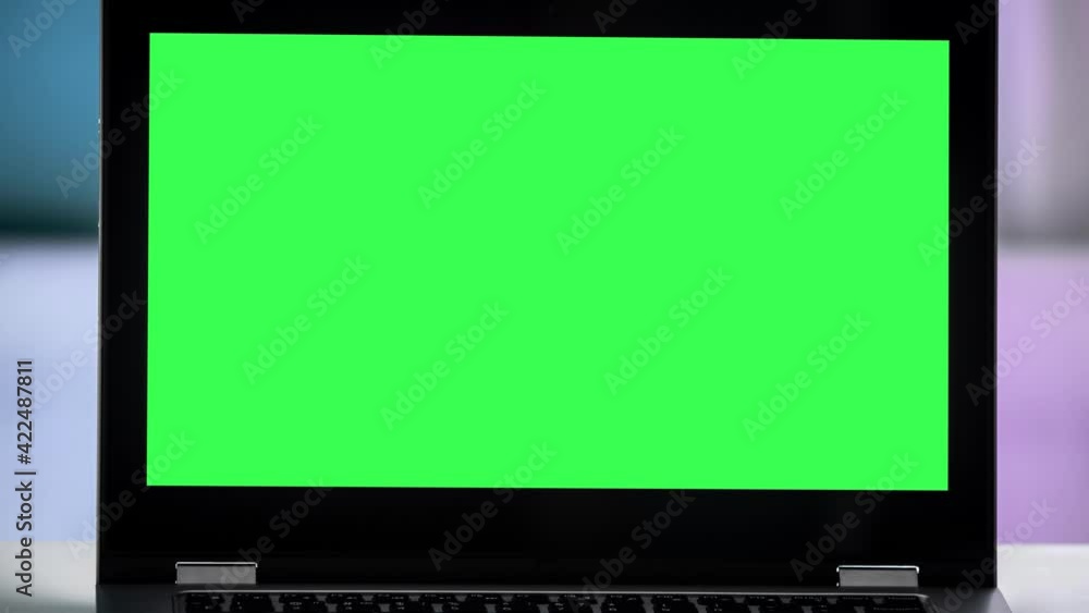 Poster working in the evening. laptop with green screen. zoom in. template for keying