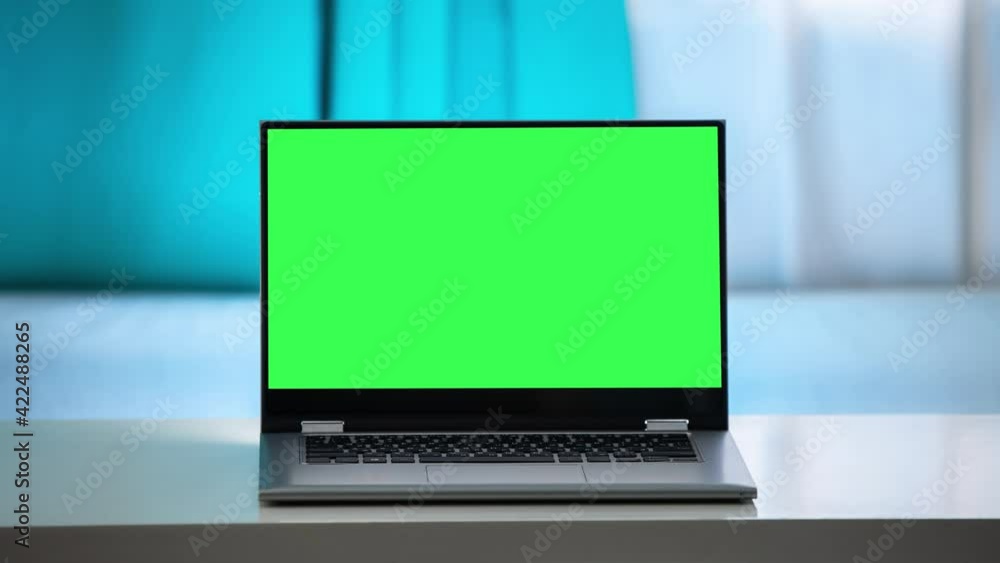 Poster working in the evening. laptop with green screen. zoom in. template for keying